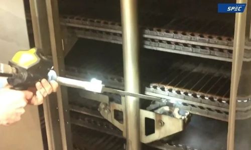 Cleaning industrial oven with dry ice blasting